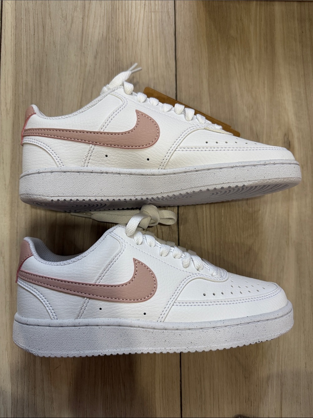 Nike White Sneakers with Blush Pink Swoosh